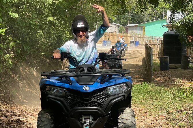 ATV and Bamboo Rafting With limestone foot massage and transport - Guides and small moments: Lynval, Richard, and the trivia detour