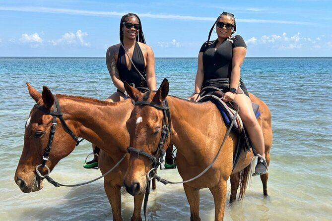 ATV , Bamboo Rafting & Horseback Ride Tour From Montego Bay - Stop 1: White River Calypso Bamboo Rafting (and Tubing)