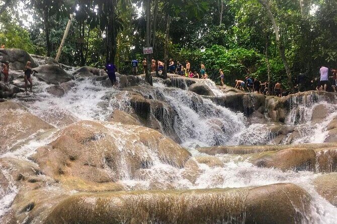 Bamboo Rafting, Dunn's River Falls and Horseback Riding Private Tour - Martha Brae Bamboo Rafting: Calm Three Miles and Local Storytelling