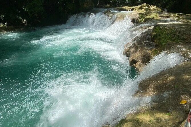 Blue Hole, Secret Falls & River Rapids Tubing from Montego Bay - “Secret Falls” on the title, but the day’s real stops matter