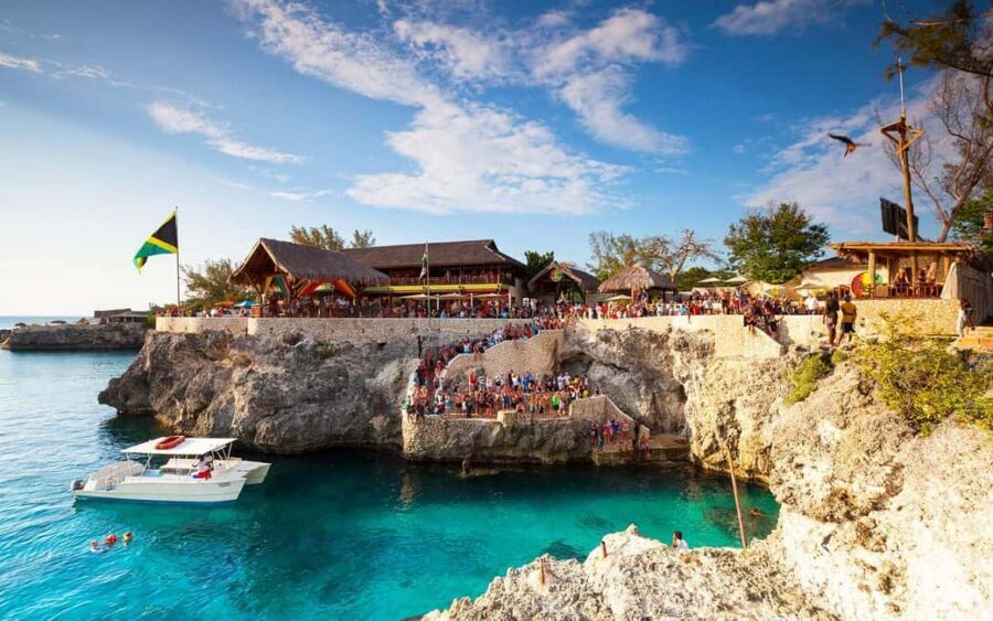 From Montego Bay/Falmouth: Negril Beach Catamaran Cruise - Seven Mile Beach Time: Where the Water Looks Like It Was Filtered