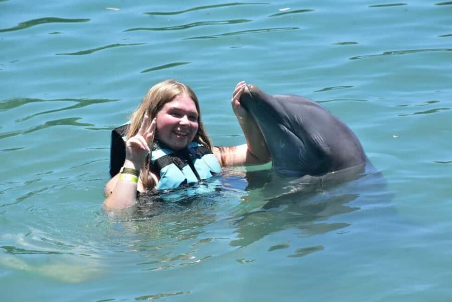 Montego Bay: Swim With The Dolphins Adventure in Lucea - Hip Strip Shopping Stop: A Short Break That Can Help or Hurt