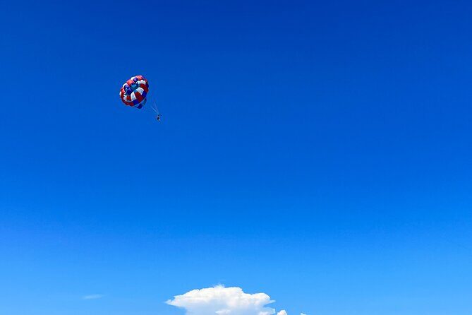 Parasailing above Turquoise Ocean Waters in Montego Bay - Provider Notes: OceanShootJamaica Tours and the Human Touch
