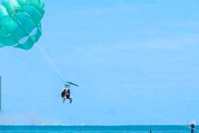 Parasailing above Turquoise Ocean Waters in Montego Bay - Getting There Smoothly: Pickup, Changing Area, and Included Extras