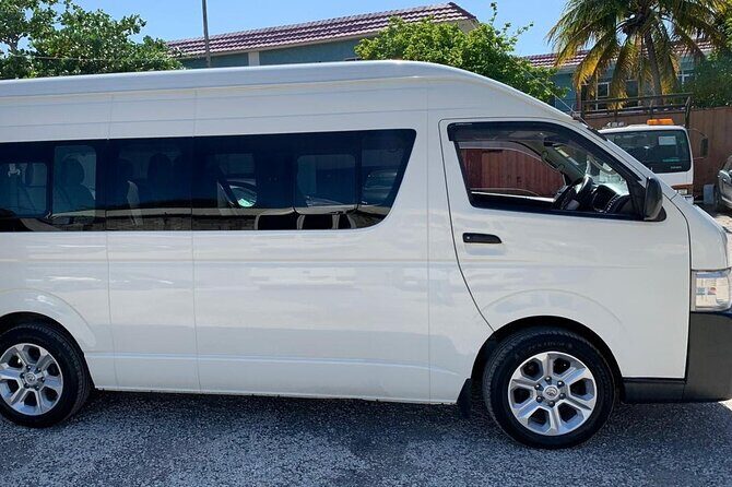 Private Montego Bay Jamaica Airport Transfer to Montego Bay Hotel - Getting Met at MBJ: Sign Pickup, Luggage Help, and On-Board Comfort