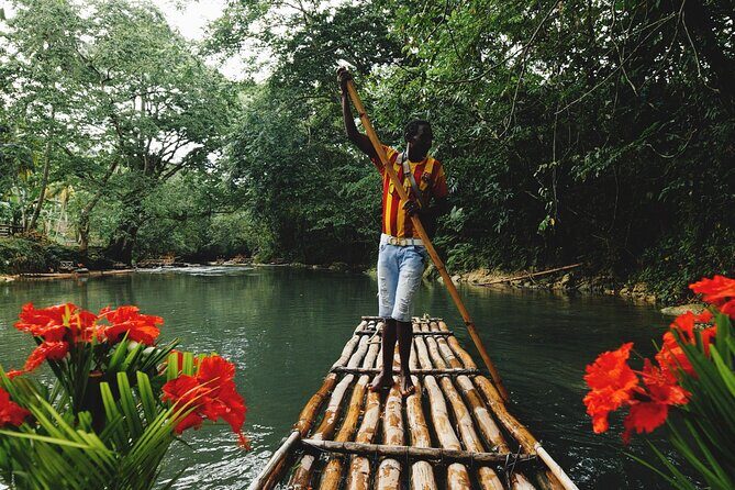 Rio Nuevo Bamboo River Rafting & Dunn's River Falls - Rio Nuevo Bamboo River Rafting: calm water, rainforest scenery, and captain-guided ease